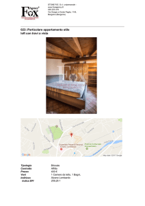 023::Particolare appartamento stile loft con travi a vista